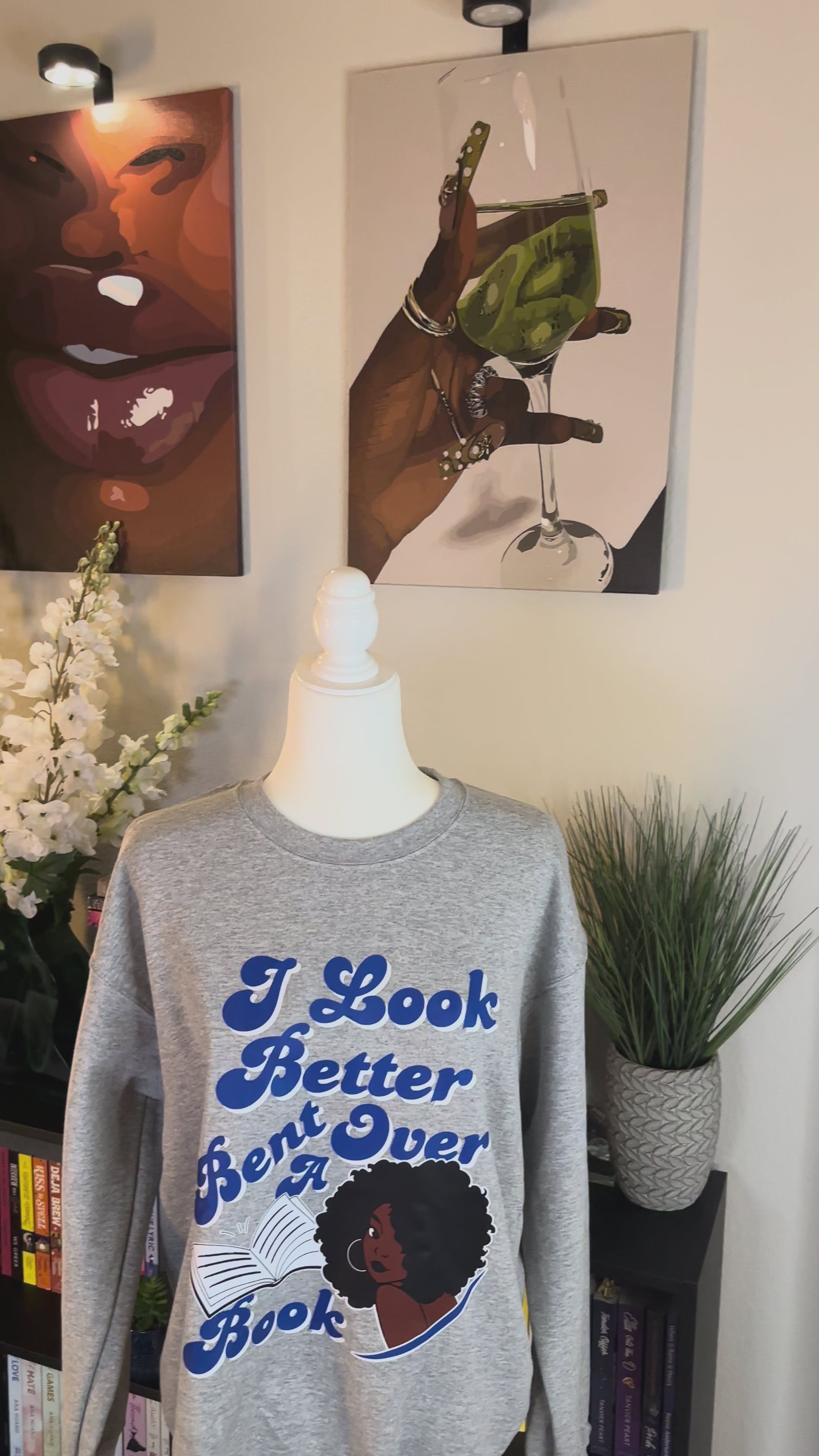 Bent Over A Book Sweatshirt